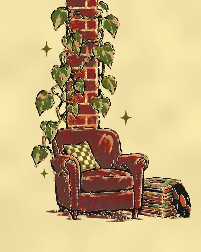 Pothos climbing a brick column above a leather chair and records